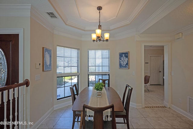 dining space featuring light tile patterned floors, visible vents, and an inviting chandelier