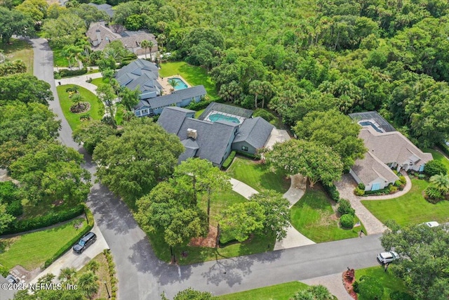 birds eye view of property with a residential view