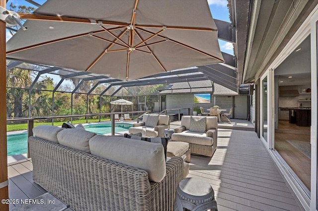 view of patio / terrace with glass enclosure, an outdoor pool, and an outdoor hangout area