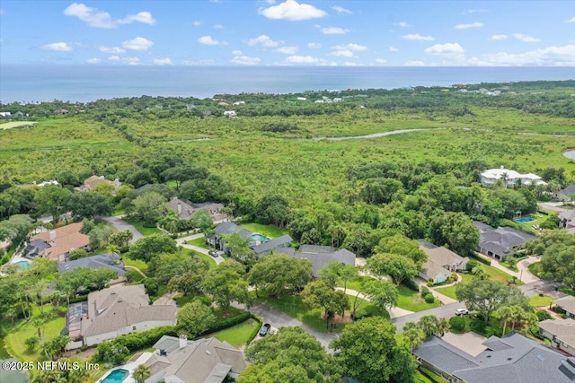 bird's eye view featuring a residential view and a water view