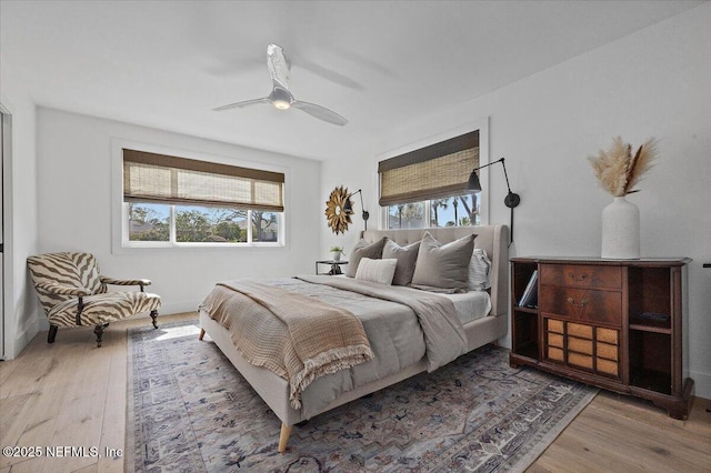 bedroom with wood finished floors and ceiling fan