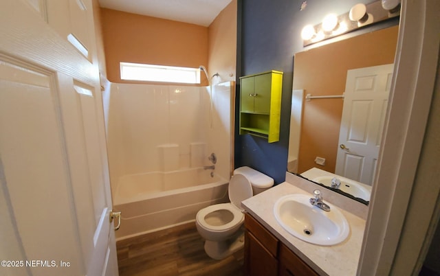 bathroom with shower / tub combination, vanity, toilet, and wood finished floors