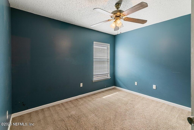 3925 Leatherwood Dr, Orange Park, FL 32065 - empty room featuring carpet, ceiling fan, a textured ceiling, and baseboards