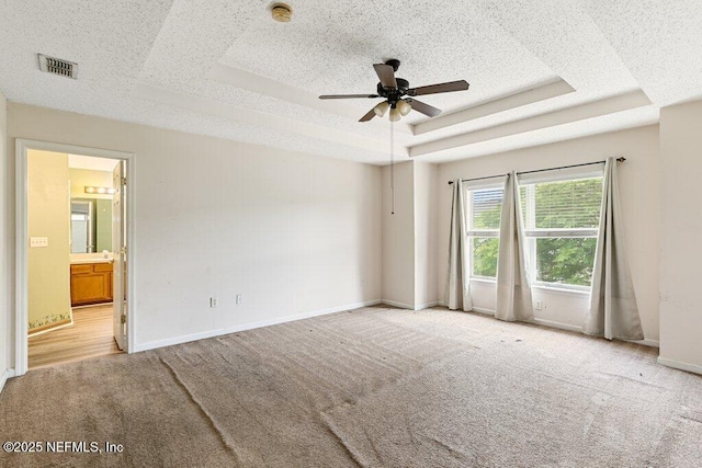 3925 Leatherwood Dr, Orange Park, FL 32065 - carpeted spare room with a smoke detector, a ceiling fan, a raised ceiling, and baseboards