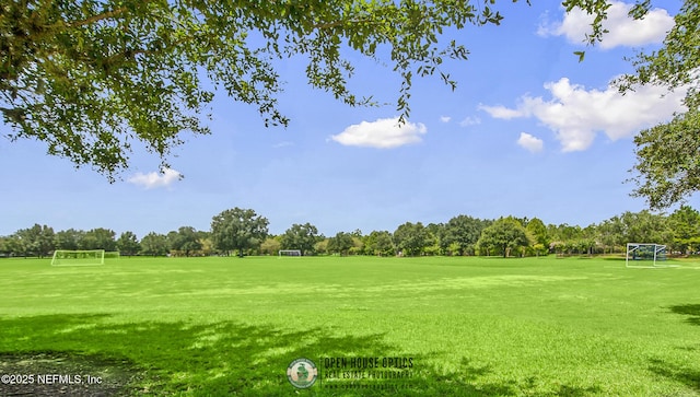 3925 Leatherwood Dr, Orange Park, FL 32065 - view of property's community featuring an area for soccer, golf course view, and view of wooded area
