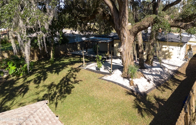 view of yard featuring a patio area and a fenced backyard