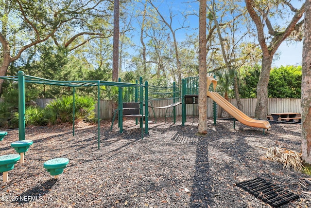 community jungle gym with fence
