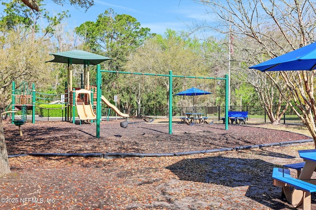 community playground featuring fence