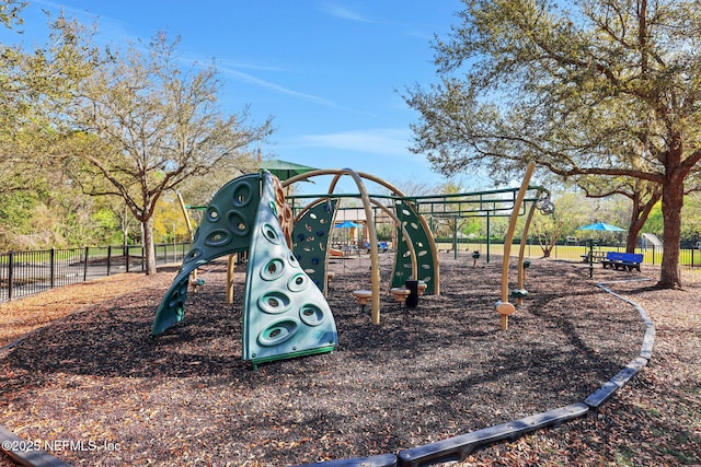 community play area featuring fence