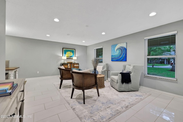tiled office with recessed lighting and baseboards