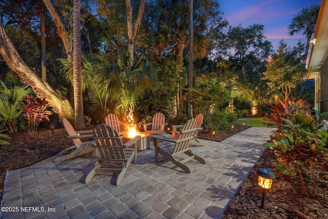 view of patio / terrace with an outdoor fire pit