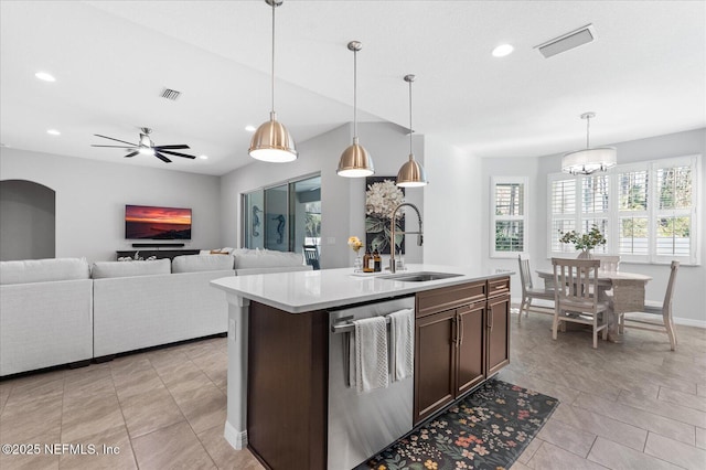 kitchen featuring light countertops, visible vents, a sink, and stainless steel dishwasher