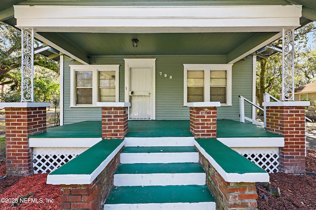 entrance to property with covered porch