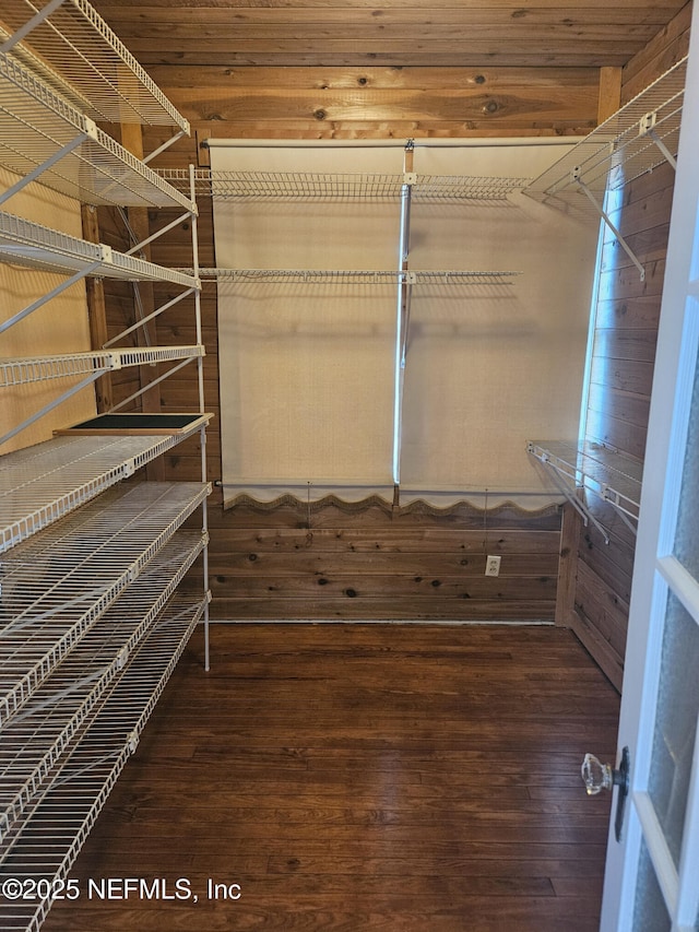 spacious closet with wood finished floors