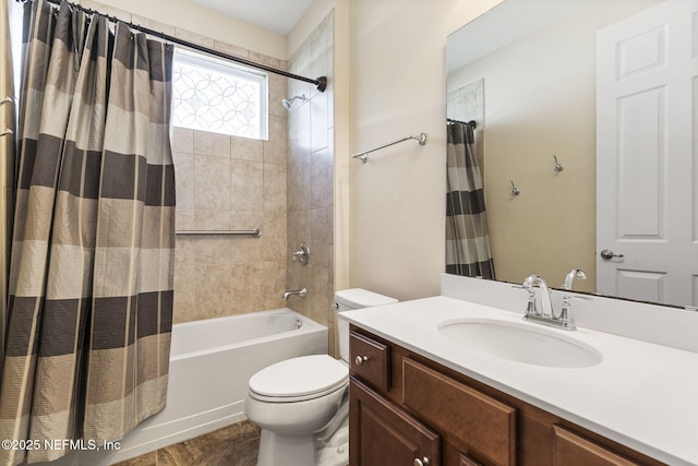 full bath with vanity, toilet, and shower / tub combo