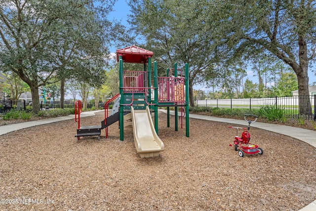 community playground featuring fence