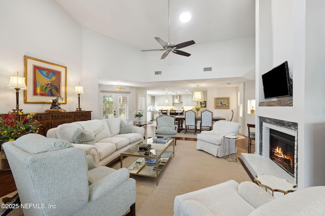22 Walkers Ridge Dr, Ponte Vedra Beach, FL 32082 - living room featuring a ceiling fan, high vaulted ceiling, a brick fireplace, and wood finished floors