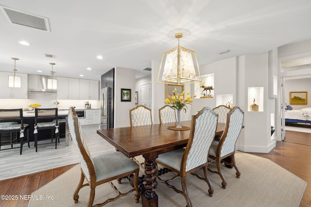 22 Walkers Ridge Dr, Ponte Vedra Beach, FL 32082 - dining area with wood finished floors, recessed lighting, and a chandelier