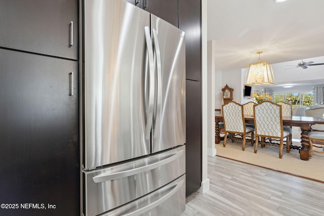 22 Walkers Ridge Dr, Ponte Vedra Beach, FL 32082 - kitchen featuring freestanding refrigerator, a ceiling fan, light wood-style floors, and decorative light fixtures