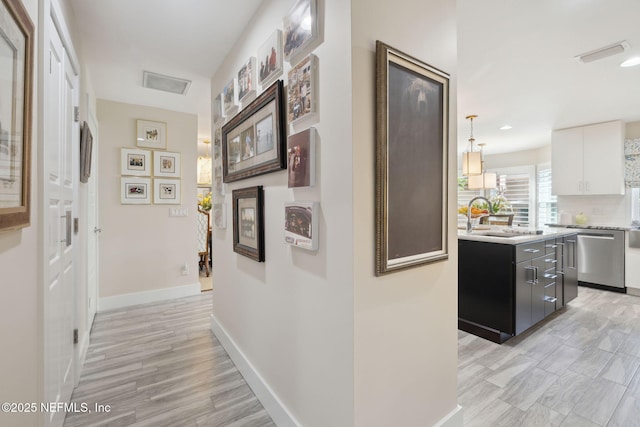 22 Walkers Ridge Dr, Ponte Vedra Beach, FL 32082 - corridor with light wood-style flooring and recessed lighting