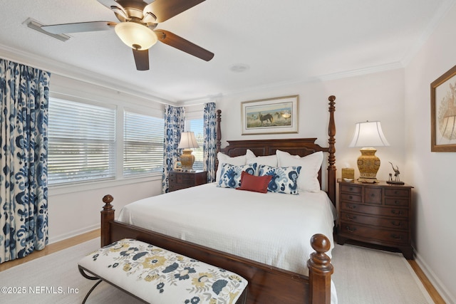 22 Walkers Ridge Dr, Ponte Vedra Beach, FL 32082 - bedroom featuring multiple windows, crown molding, wood finished floors, and a ceiling fan