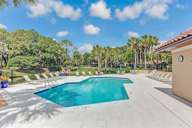 22 Walkers Ridge Dr, Ponte Vedra Beach, FL 32082 - community pool featuring a patio and view of wooded area