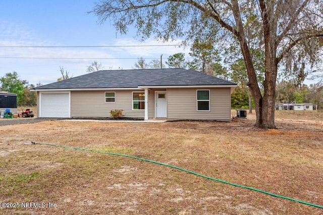 single story home with a garage