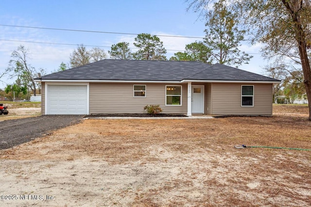 ranch-style house with driveway