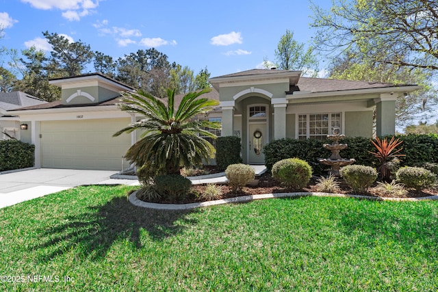 mediterranean / spanish home with stucco siding, a front lawn, a garage, and driveway