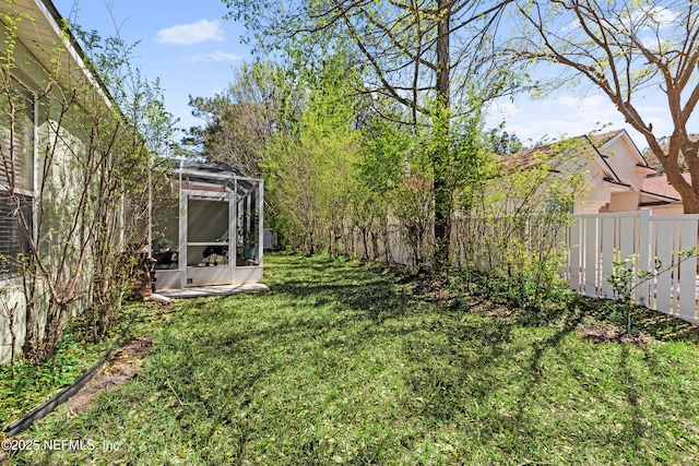 view of yard with fence