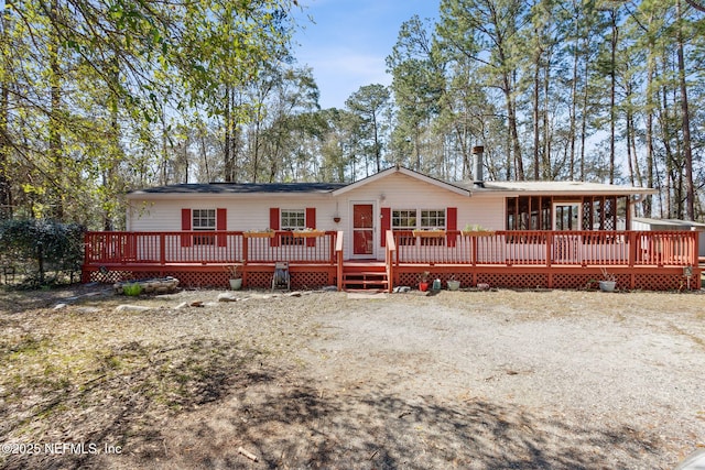 view of front of home with a deck