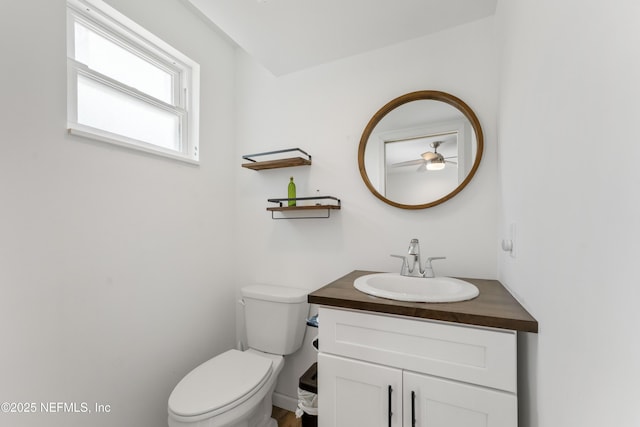 half bath with toilet and vanity