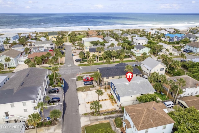 bird's eye view with a water view and a residential view