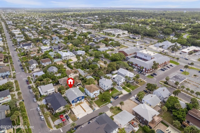 birds eye view of property with a residential view