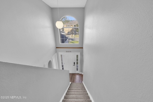 stairway with baseboards