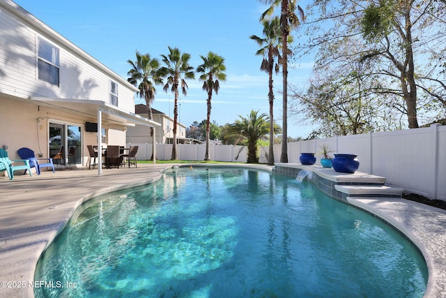 view of pool featuring a fenced in pool, a patio, and a fenced backyard