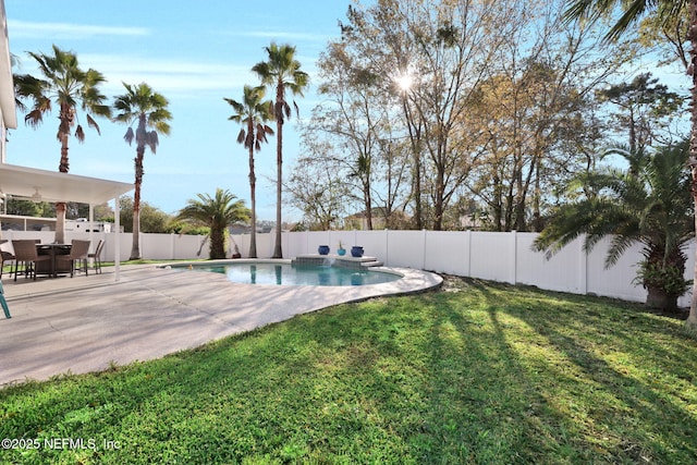 view of swimming pool featuring a fenced in pool, a lawn, a fenced backyard, and a patio area