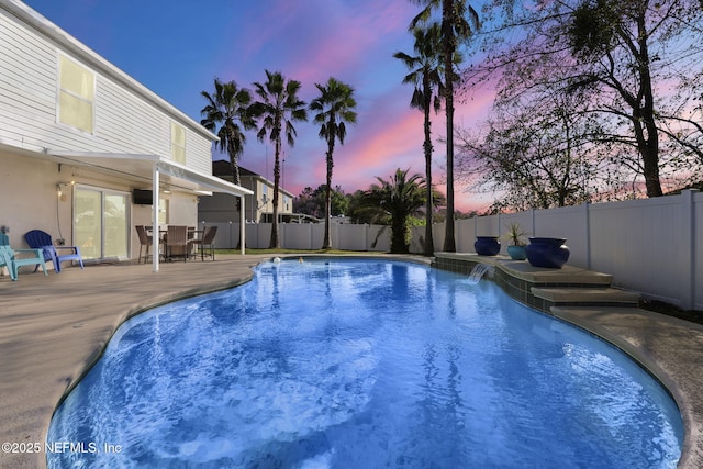 view of swimming pool with a fenced backyard and a fenced in pool