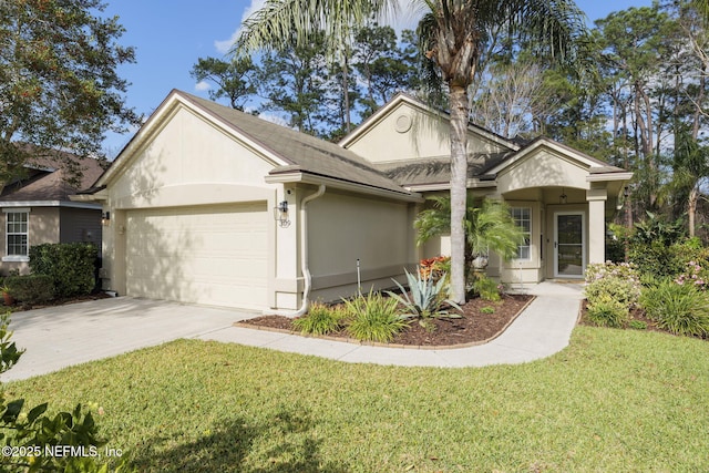 ranch-style home with a garage, a front yard, driveway, and stucco siding