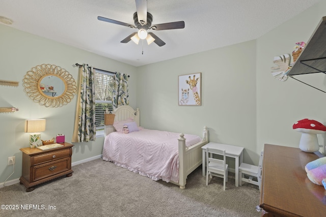 bedroom with carpet flooring, a ceiling fan, and baseboards