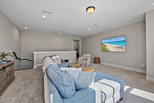 living room with light carpet, visible vents, recessed lighting, and baseboards