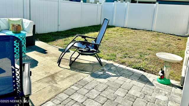 view of patio / terrace with a fenced backyard