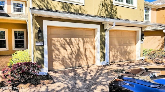 garage featuring driveway