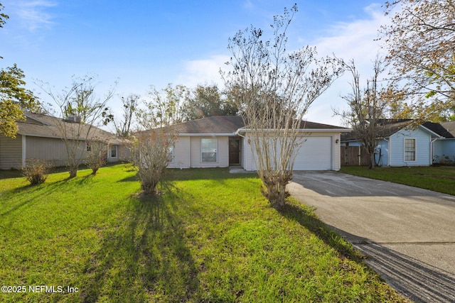 ranch-style home with a front lawn, an attached garage, driveway, and fence