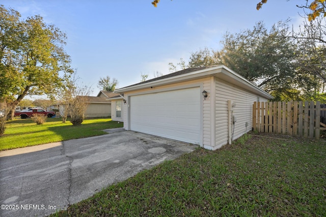 detached garage with fence