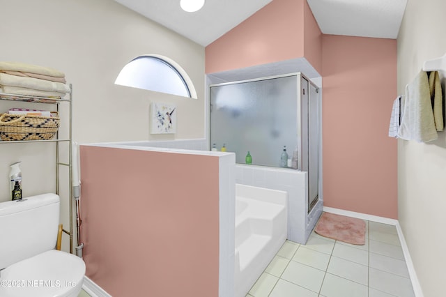 bathroom featuring a garden tub, toilet, baseboards, tile patterned floors, and a stall shower