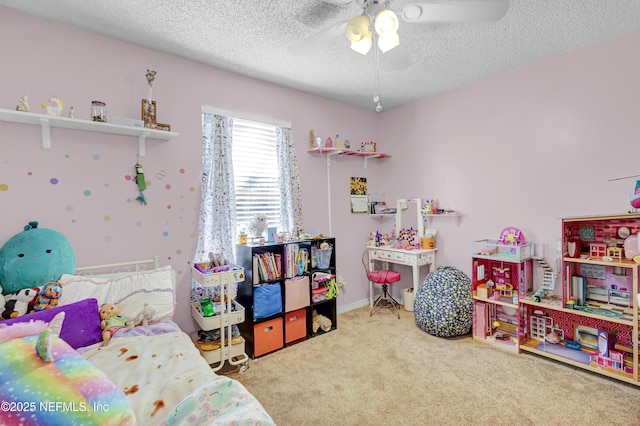 carpeted bedroom featuring a textured ceiling and ceiling fan