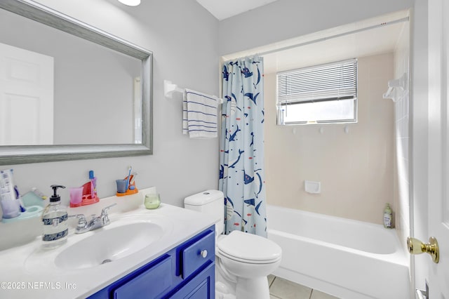 full bathroom featuring toilet, tile patterned flooring, shower / bath combo with shower curtain, and vanity