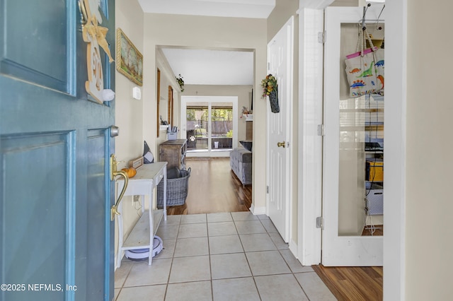 foyer with light tile patterned flooring