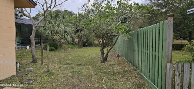 view of yard with fence